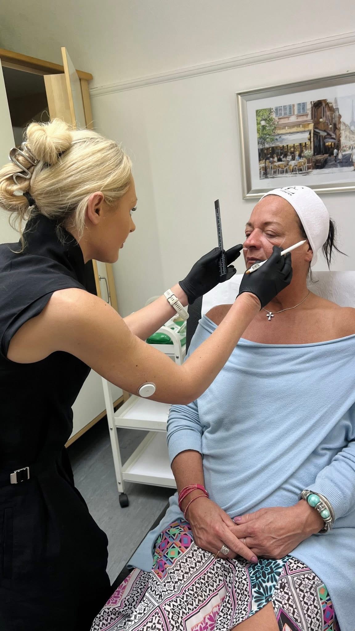 Kitty Jacobs performing a precision aesthetic treatment at NurseÉlite Aesthetics